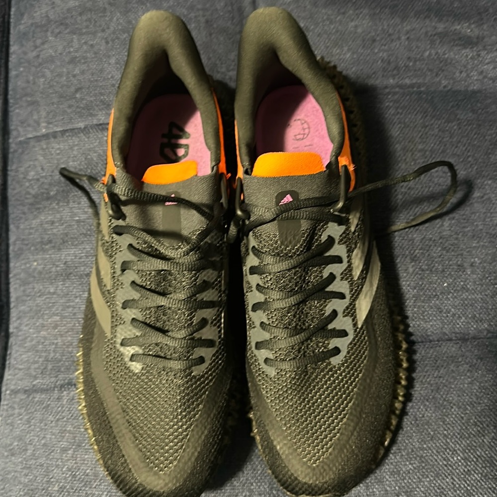 Lightly worn size 12 Adidas 4D, color: black, charcoal, orange, and purple